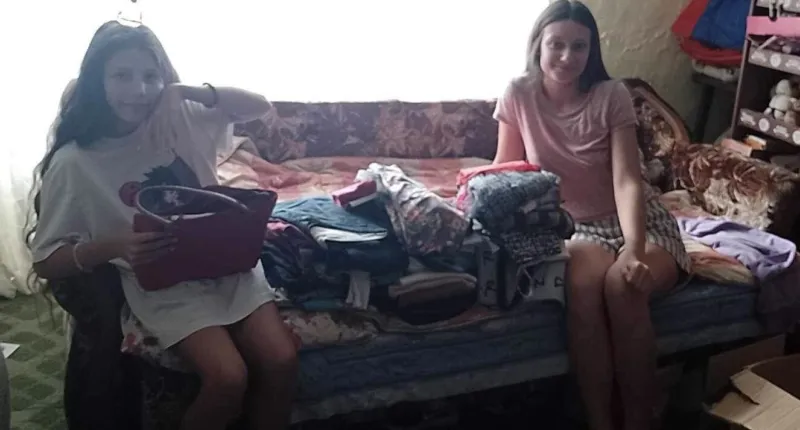 Donacija  dva paketa garderobe sestrama Ignjatović